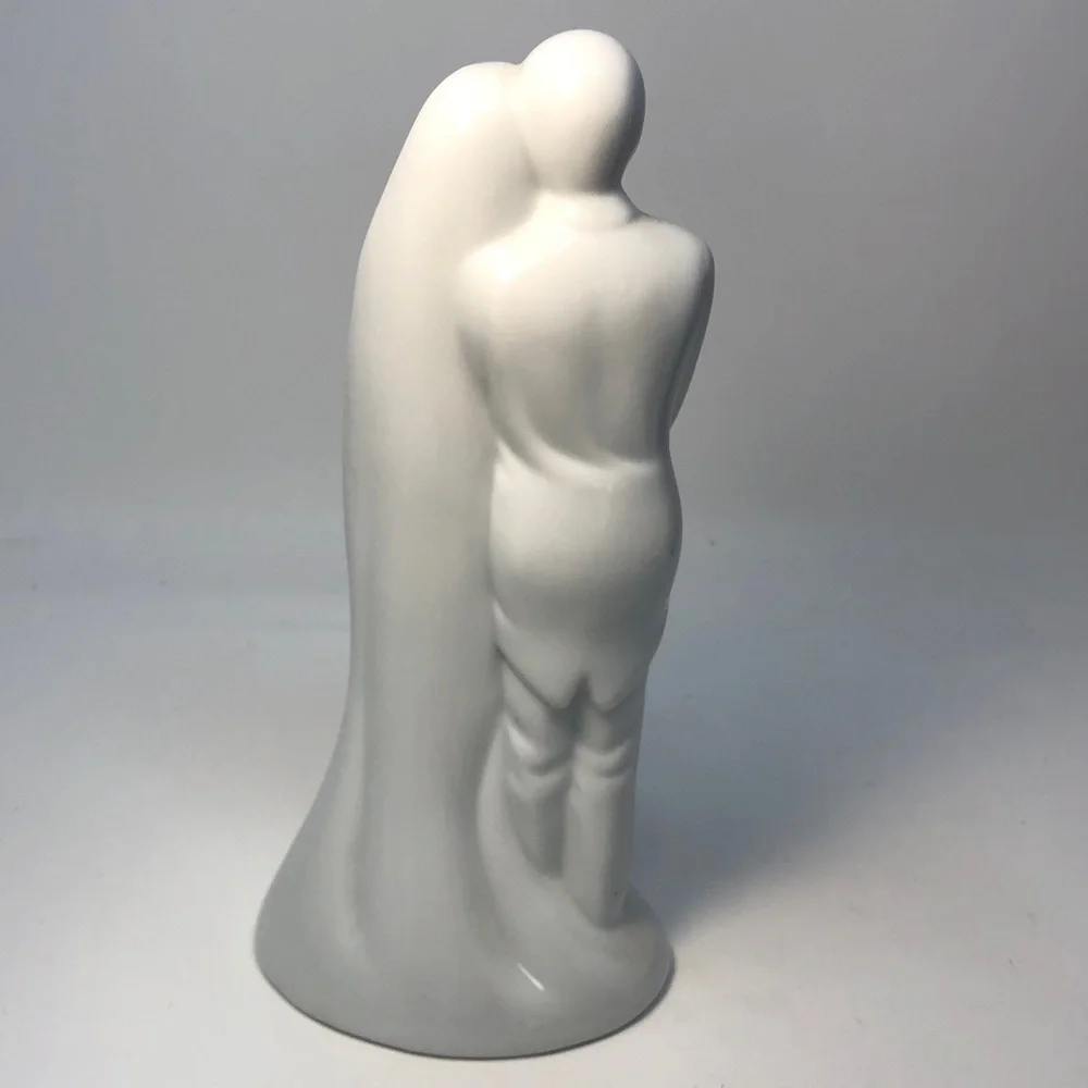 Elegant White porcelain Wedding Cake topper vintage collectible.